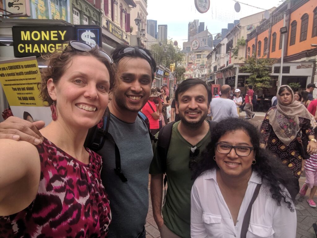 Four friends smiling