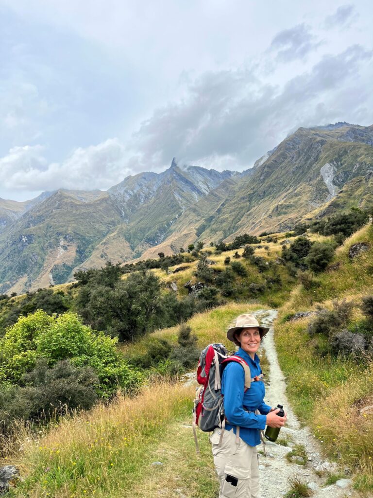 Woman bushwalking in New Zealand