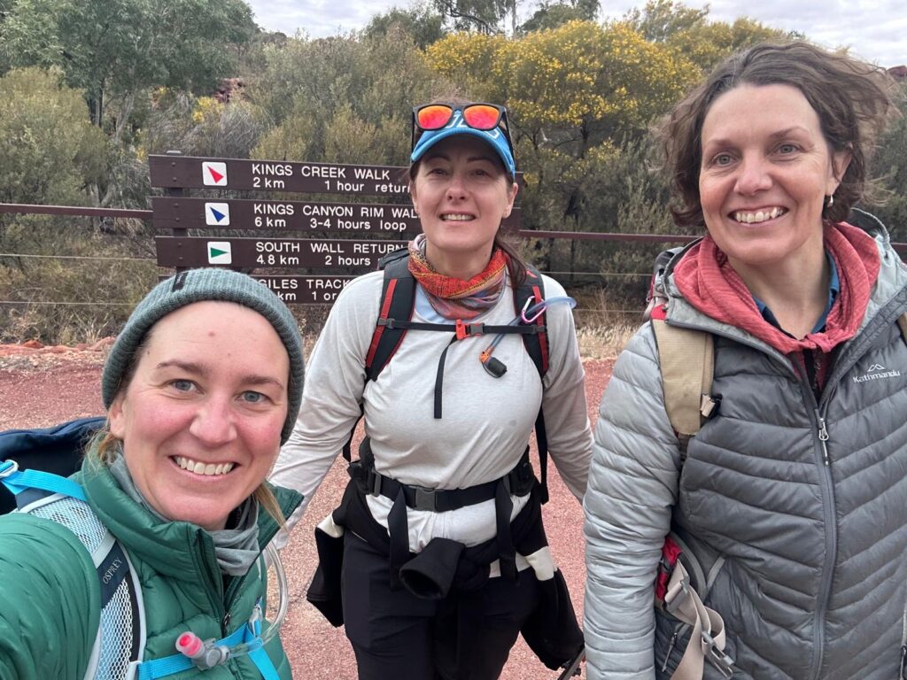 Three friends about to set off on a hike